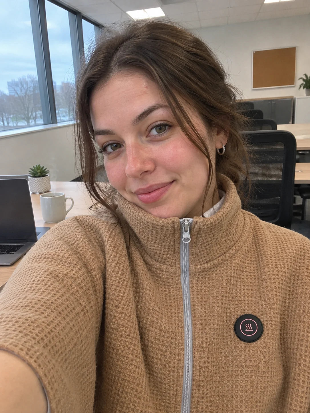 Customer wearing the heated shawl while working